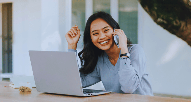 Invisible Braces 9 Woman Smiling While Talking On The Phone - kohe Dental
