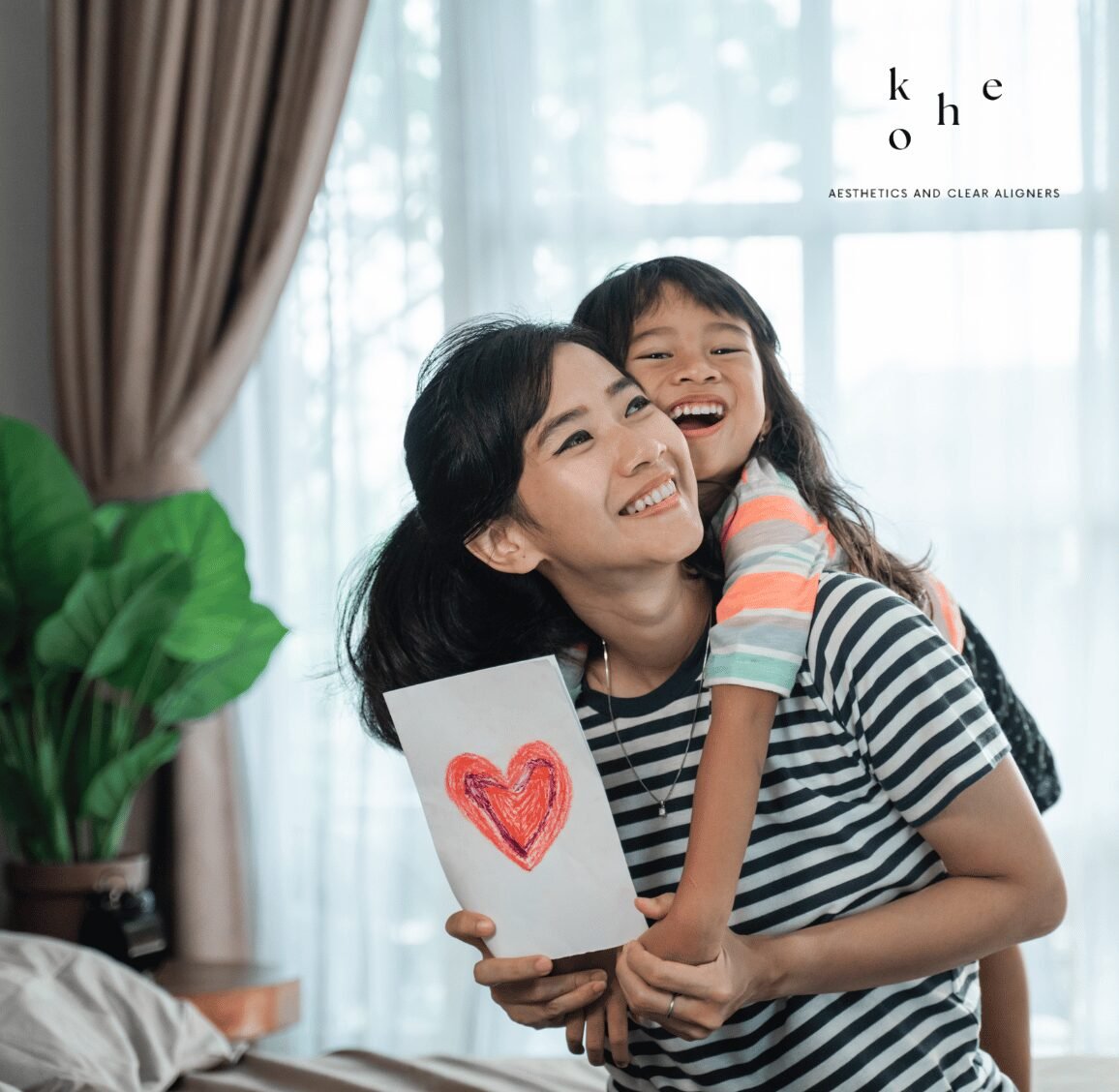 Invisalign First 7 Mother and Child Smiling - kohe Dental